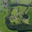 Oblique aerial view centred on the walled garden with the stable block adjacent, taken from the NE.