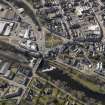 Oblique aerial view of the town centred on the bridge, taken from the NW.