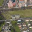 Oblique aerial view centred on Nairn's south factory with the office block adjacent, taken from the S.