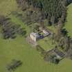 Oblique aerial view of the house with the office court adjacent, taken from the SE.