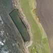 Oblique aerial view centred on the swimming pool, taken from the ESE.
