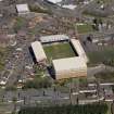 Oblique aerial view centred on the football ground, taken from the S.
