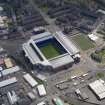 Oblique aerial view centred on the football ground, taken from the WNW.