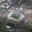 Oblique aerial view centred on the football ground, taken from the SSE.