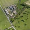 Oblique aerial view centred on the poultry farm with the airfield dispersed site adjacent, taken from the NW.