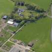 Oblique aerial view centred on the aircraft hangars with Hatton House adjacent, taken from the NNE.