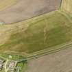 0blique aerial view of the cropmarks of the field boundaries at West Cairngaan, taken from the SE.