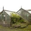 View of greenhouses and conservatory from N