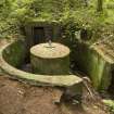 View from E showing emplacement, entrance, concrete mounting and magazine.