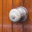 Detail of handle on door of wood-panelled cupboard in lighthouse tower.