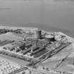Oblique aerial view centred on, Granton Gas Works, Edinburgh, in 1949.
