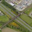 Oblique aerial view centred on the railway viaduct, taken from the SW.