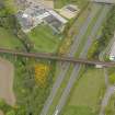 Oblique aerial view centred on the railway viaduct, taken from the SE.