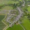 General oblique aerial view centred on the village, taken from the N.