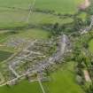 General oblique aerial view centred on the village, taken from the NNW.