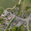 Oblique aerial view centred on the village centre, taken from the NE.