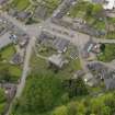 Oblique aerial view centred on the village centre, taken from the NE.