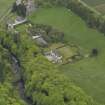 Oblique aerial view centred on the Lodge with Octagon Cottage adjacent, taken from the N.