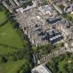 Oblique aerial view centred on the Quartermile development and the former Edinburgh Royal Infirmary, taken from the SE.