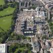 Oblique aerial view centred on the Quartermile development and the former Edinburgh Royal Infirmary, taken from the E.