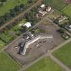 Oblique aerial view centred on Craigmillar primary school, taken from the SW.