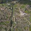 General oblique aerial view centred on Niddrie Mains Road and Niddrie Mains and Niddrie Marischal estates, taken from the NE.