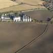 Oblique aerial view of the soilmarks of the fort with the Pentcaitland maltings adjacent, taken from the SW.