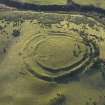 Oblique aerial view of the remains of the Kildlaw fort and setllement, taken from the NNE.
