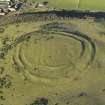 Oblique aerial view of the remains of the Kildlaw fort and setllement, taken from the SE.