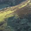 Oblique aerial view of the remains of the Hare Law fort, taken from the NW.