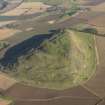 Oblique aerial view of the remains of Traprain Law fort, taken from the WSW.