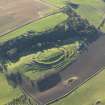 Oblique aerial view of the remains of the fort and settlement at The Chesters, Drem, taken from the NNE.