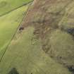 Oblique aerial view of the remains of the buildings and settlement at Cockburn Law, taken from the NNE.