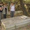 Clare Sorensen, Amanda Gow and Laura Bishop standing by grave plot no. 628, Rev. Thomas Jones