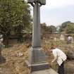 Grave plot no. 875 with Amanda Gow measuring monument, from E