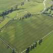 Oblique aerial view centred on the cropmarks of the pit-alignment and unenclosed settlement, taken from the NE.