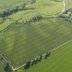 Oblique aerial view centred on the cropmarks of the pit-alignment and unenclosed settlement, taken from the NE.