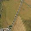 Oblique aerial view centred on the cropmarks of the rectilinear enclosure at Tayock, taken from the ESE.