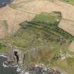 General oblique aerial view centred on the coast battery, taken from the SE.