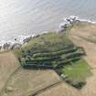 General oblique aerial view centred on the coast battery, taken from the N.