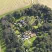 Oblique aerial view centred on the House with the gardens adjacent , taken from the SW.