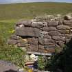 Kearvaig Farmsteading. View from the W of the blocked fireplace in the inner face of the E gable of the range.
