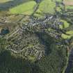 Oblique aerial view centred on the town, taken from the W.