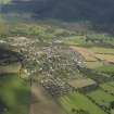 General oblique aerial view centred on the town, taken from the SSE.