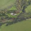 Oblique aerial view centred on the cottage, taken from the NW.