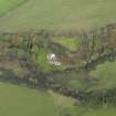 Oblique aerial view centred on the cottage, taken from the W.