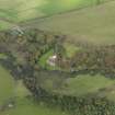 Oblique aerial view centred on the cottage, taken from the SW.