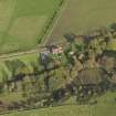 Oblique aerial view centred on the cottage, taken from the W.