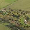 Oblique aerial view centred on the cottages, taken from the WSW.