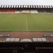 View of pitch and North Bank enclosure from director's seating in the Main Stand of St Mirren Park